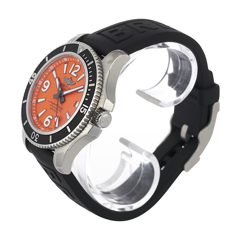 The stainless steel fake watch has an orange dial.